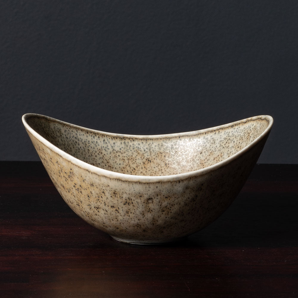 Gunnar Nylund for Rörstrand, Sweden, ceramic elliptical bowl with speckled light brown and gray glaze L3508