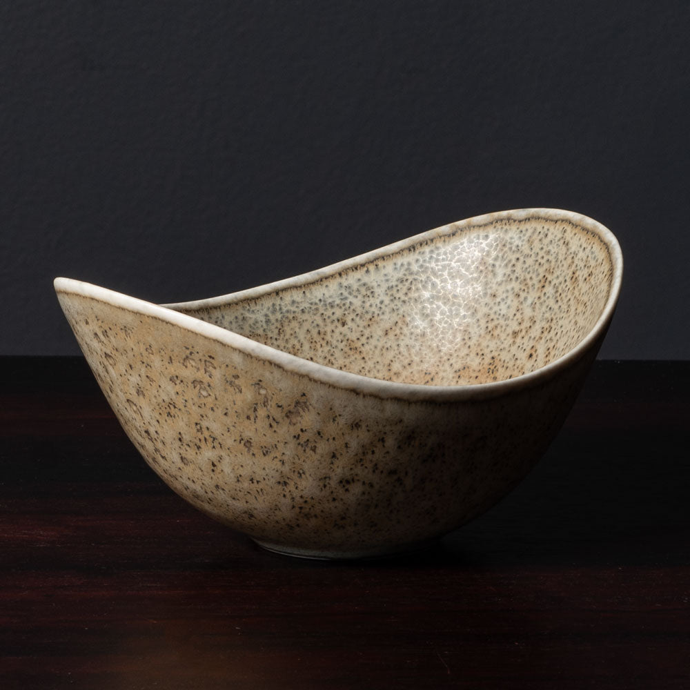 Gunnar Nylund for Rörstrand, Sweden, ceramic elliptical bowl with speckled light brown and gray glaze L3508
