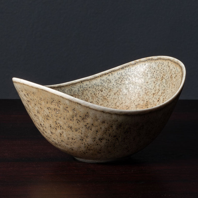 Gunnar Nylund for Rörstrand, Sweden, ceramic elliptical bowl with speckled light brown and gray glaze L3508