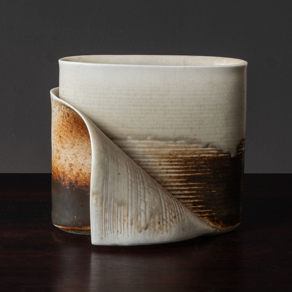 Gotlind Weigel, own studio, Germany, stoneware sculptural vase with cream and brown glaze K2876