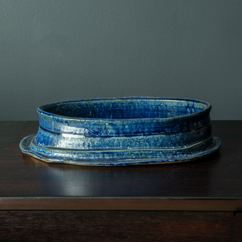 Betty Woodman, US unique stoneware bowl with glossy blue glaze H1247