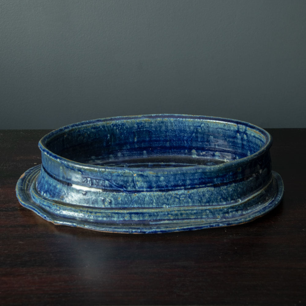 Betty Woodman, US unique stoneware bowl with glossy blue glaze H1247