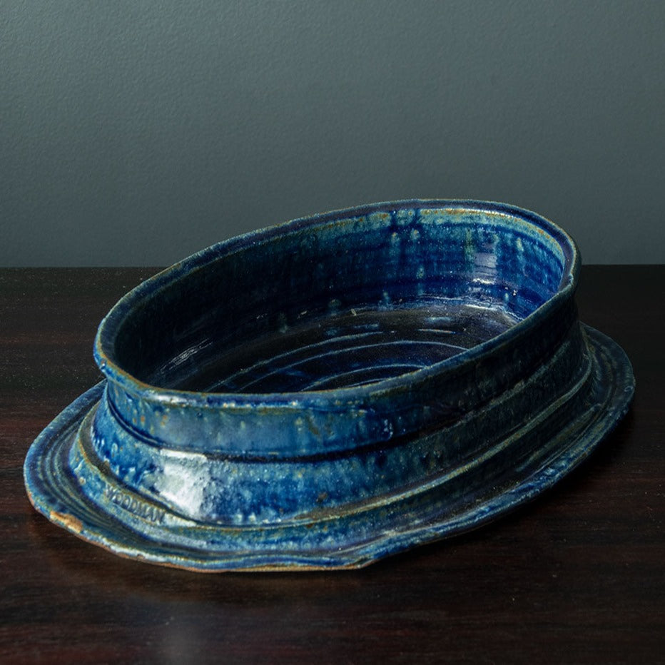 Betty Woodman, US unique stoneware bowl with glossy blue glaze H1247