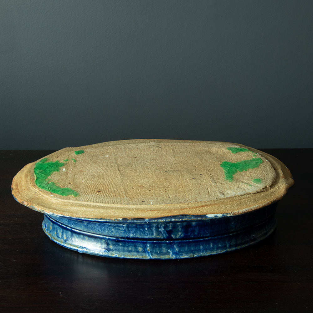 Betty Woodman, US unique stoneware bowl with glossy blue glaze H1247