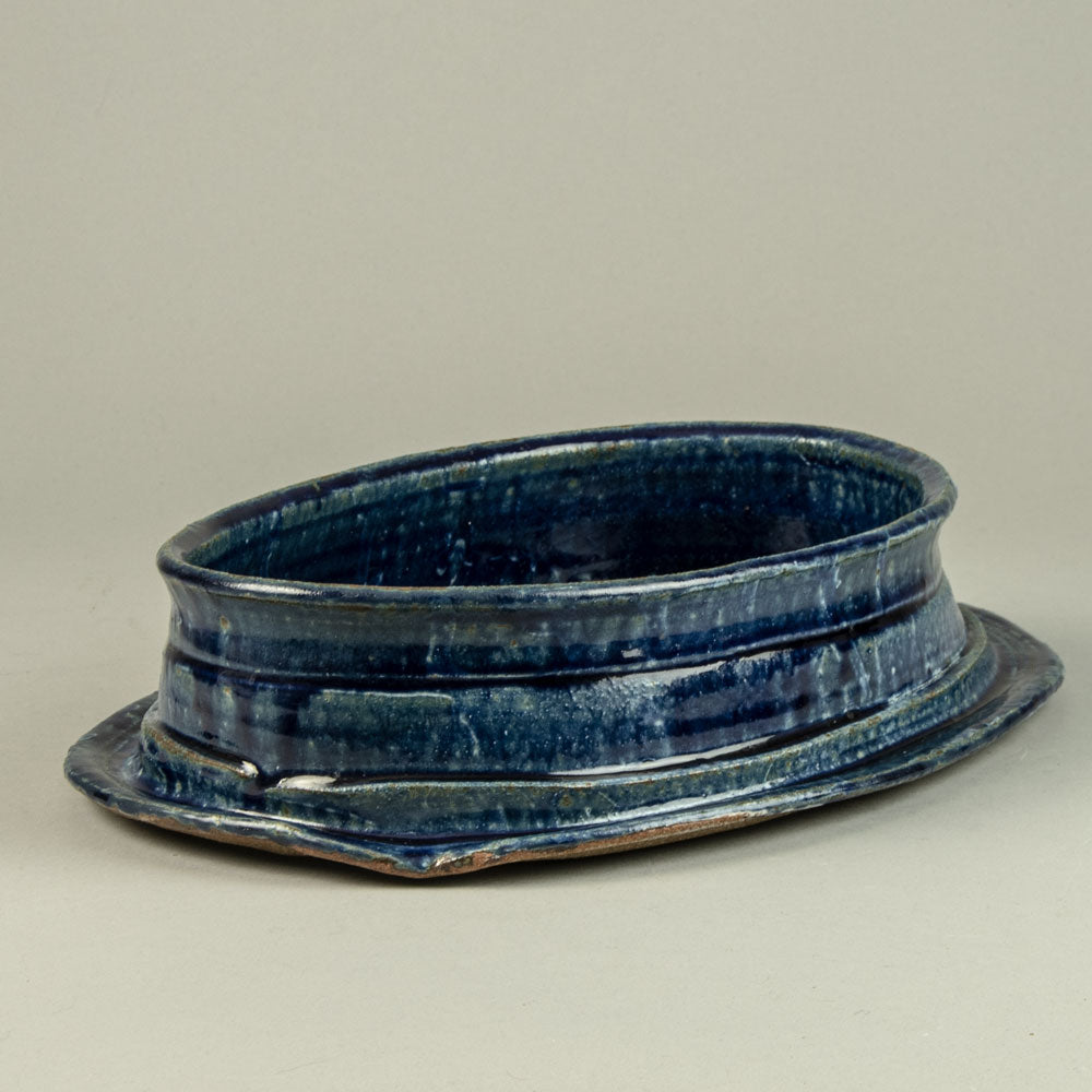 Betty Woodman, US unique stoneware bowl with glossy blue glaze H1247