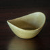 Carl Harry Stålhane for Rörstrand, Sweden, stoneware bowl with pale yellow ochre glaze H1356