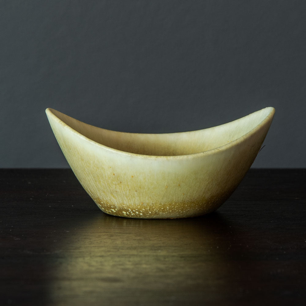 Carl Harry Stålhane for Rörstrand, Sweden, stoneware bowl with pale yellow ochre glaze H1356