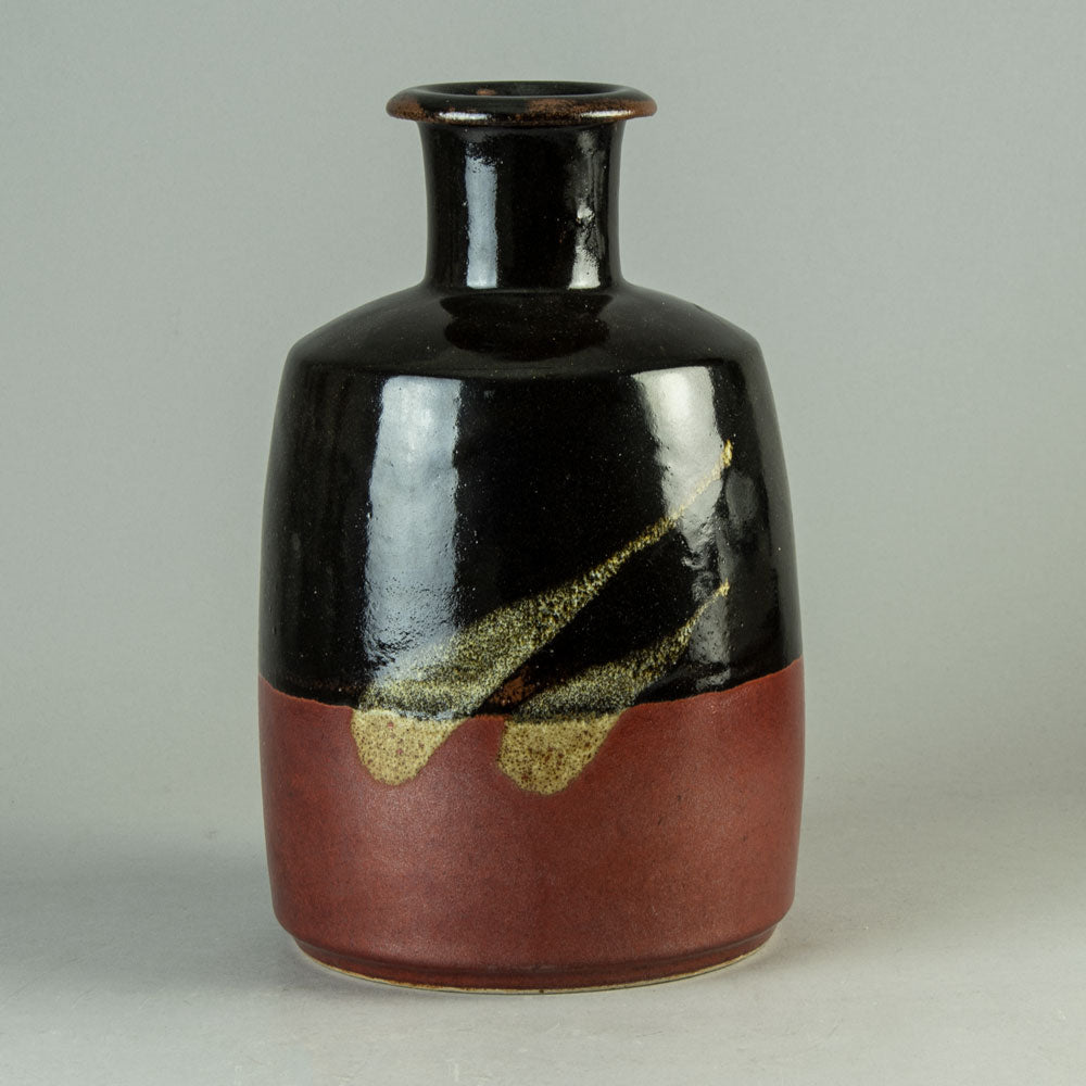 Horst Kerstan, Germany, large unique bottle vase with black and red glaze