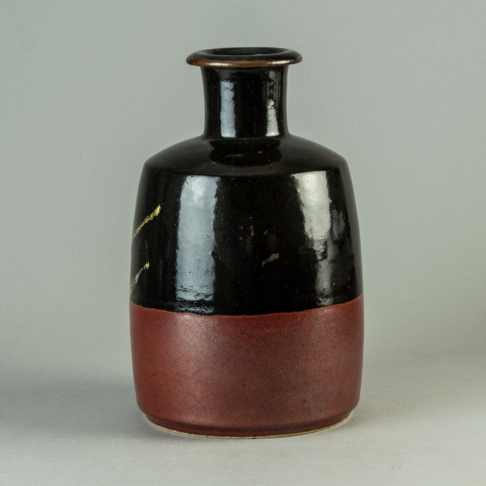 Horst Kerstan, Germany, large unique bottle vase with black and red glaze