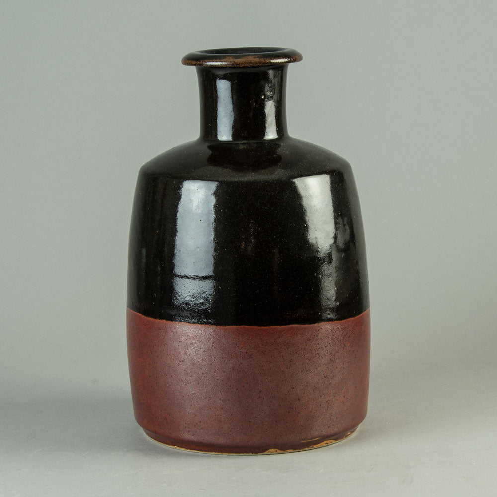 Horst Kerstan, Germany, large unique bottle vase with black and red glaze