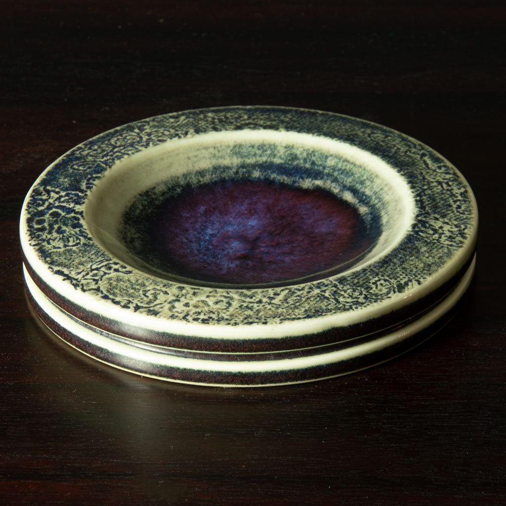 Stig Lindberg for Gustavsberg, unique stoneware dish with impressed pattern and glossy purple, black and off-white glaze H1411