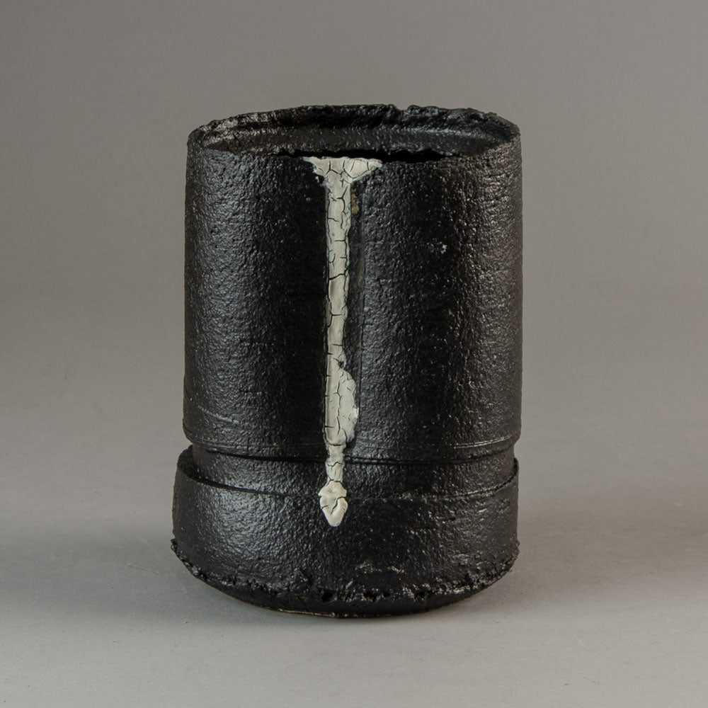 Dan Kelly, UK, stoneware pot with matte black glaze and white streak H1203