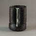 Dan Kelly, UK, stoneware pot with matte black glaze and white streak H1203