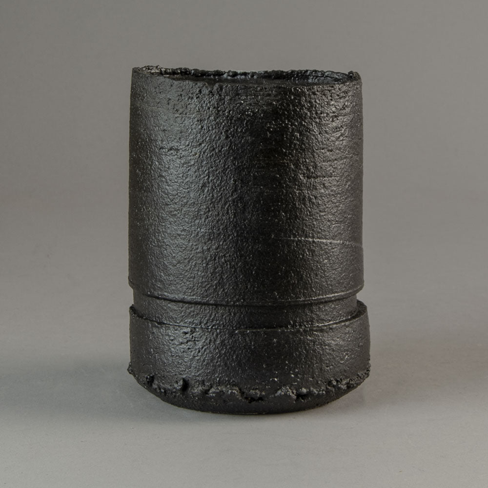 Dan Kelly, UK, stoneware pot with matte black glaze and white streak H1203