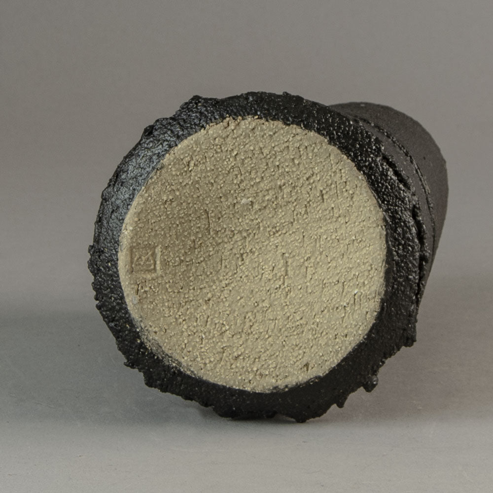 Dan Kelly, UK, stoneware pot with matte black glaze and white streak H1203