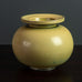 Gunnar Nylund for Rörstrand, round stoneware vase with yellow ochre glaze J1001