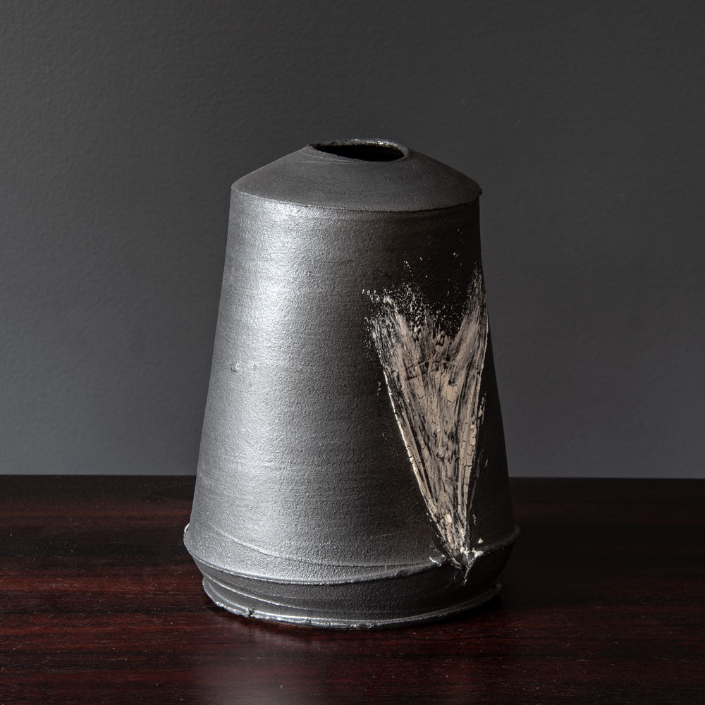 Dan Kelly, UK, stoneware pot with matte black glaze and white streak H1205