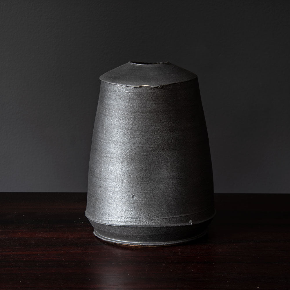 Dan Kelly, UK, stoneware pot with matte black glaze and white streak H1205