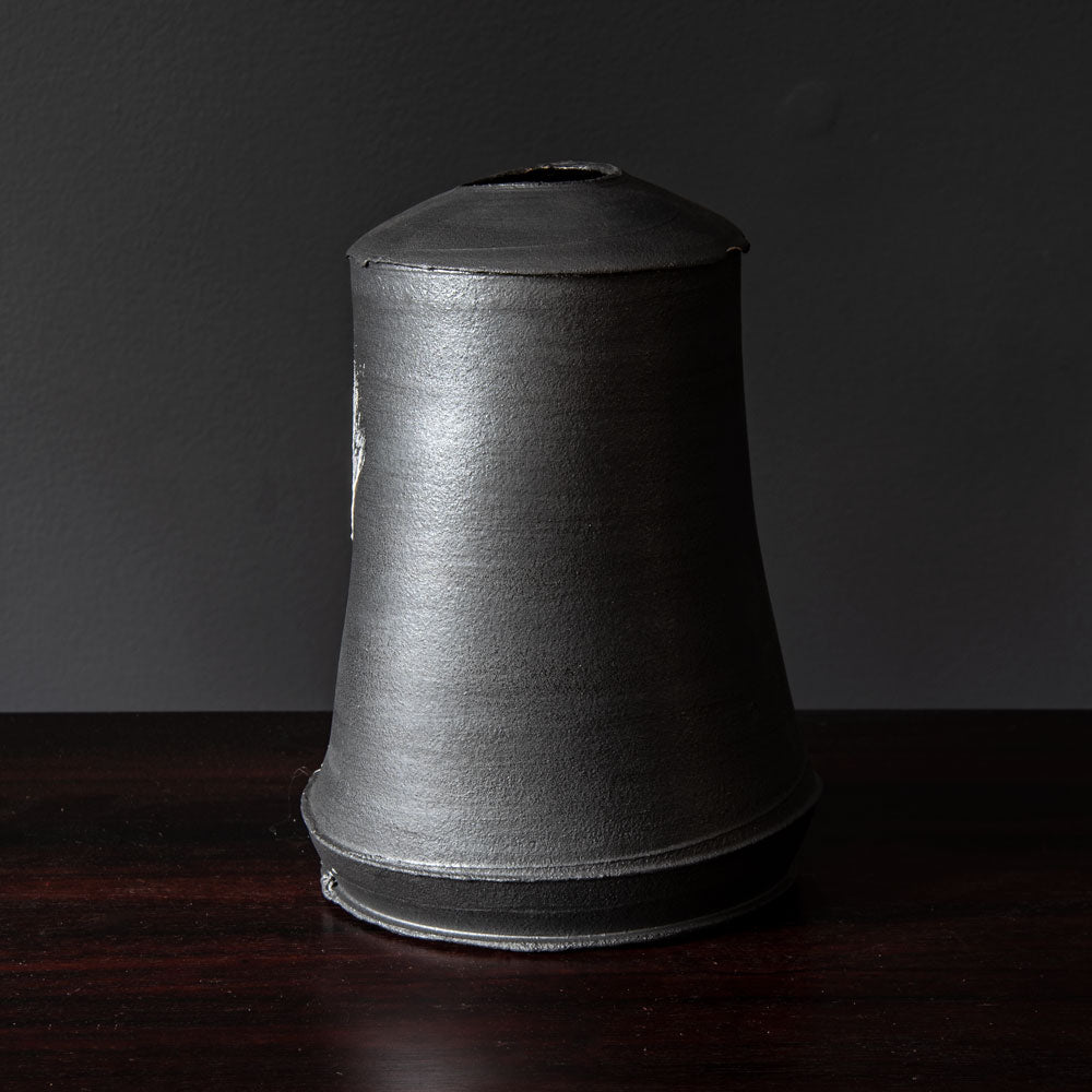 Dan Kelly, UK, stoneware pot with matte black glaze and white streak H1205