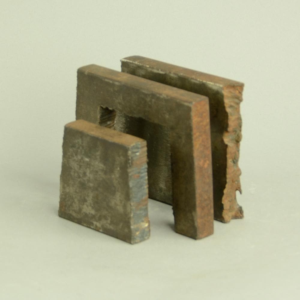 "Weighted Gate" table top sculpture in iron by Peter Bonnen