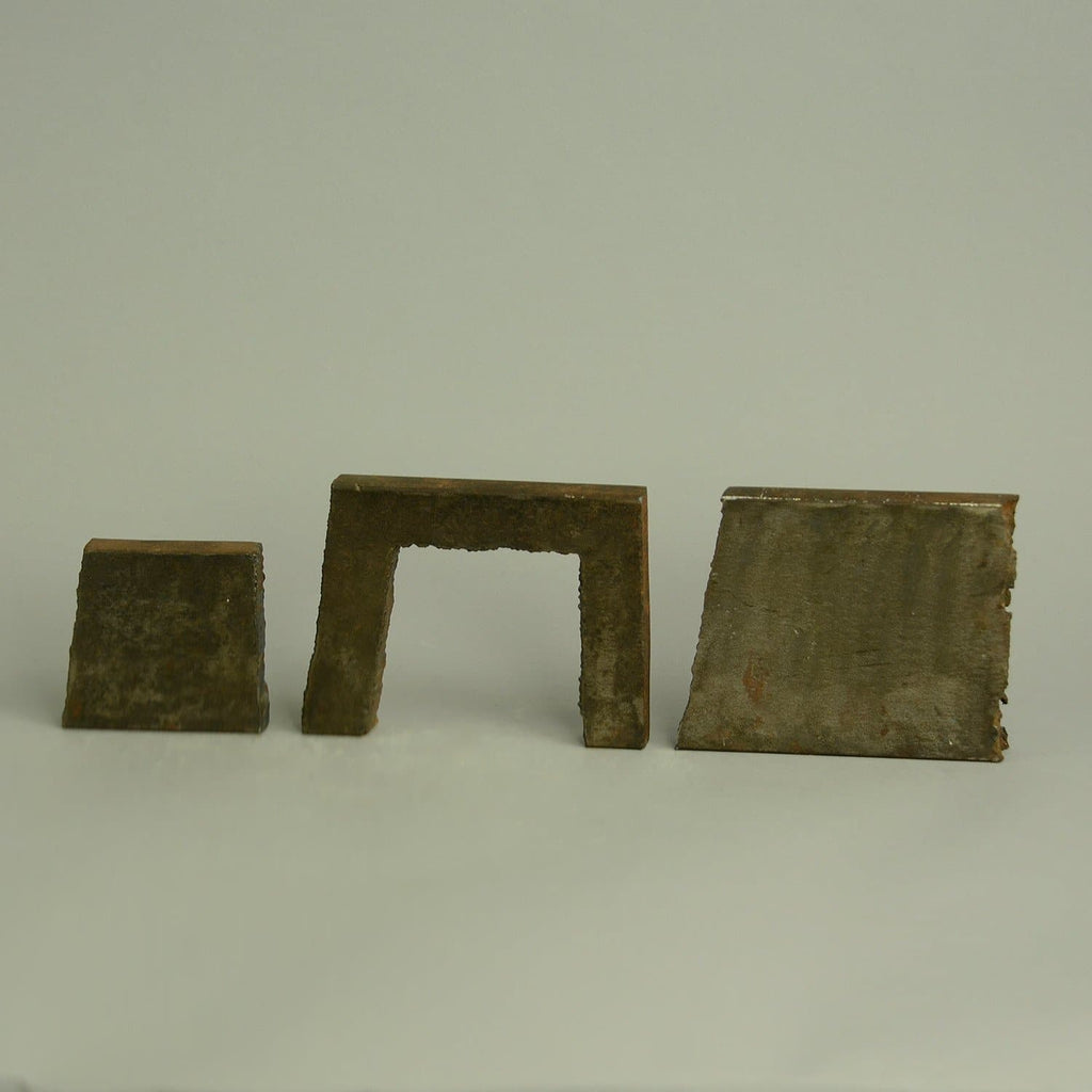 "Weighted Gate" table top sculpture in iron by Peter Bonnen