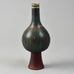 Wilhelm Kåge for Gustavsberg, "Farsta" footed vase with brick red, brown and blue matte glaze G9219 - Freeforms