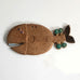 Stig Lindberg for Gustavsberg, Sweden, stoneware wall plaque of cartoon fish M5481