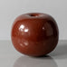 Horst Kerstan, Germany, unique round vase with glossy brick red glaze H1518