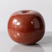 Horst Kerstan, Germany, unique round vase with glossy brick red glaze H1518