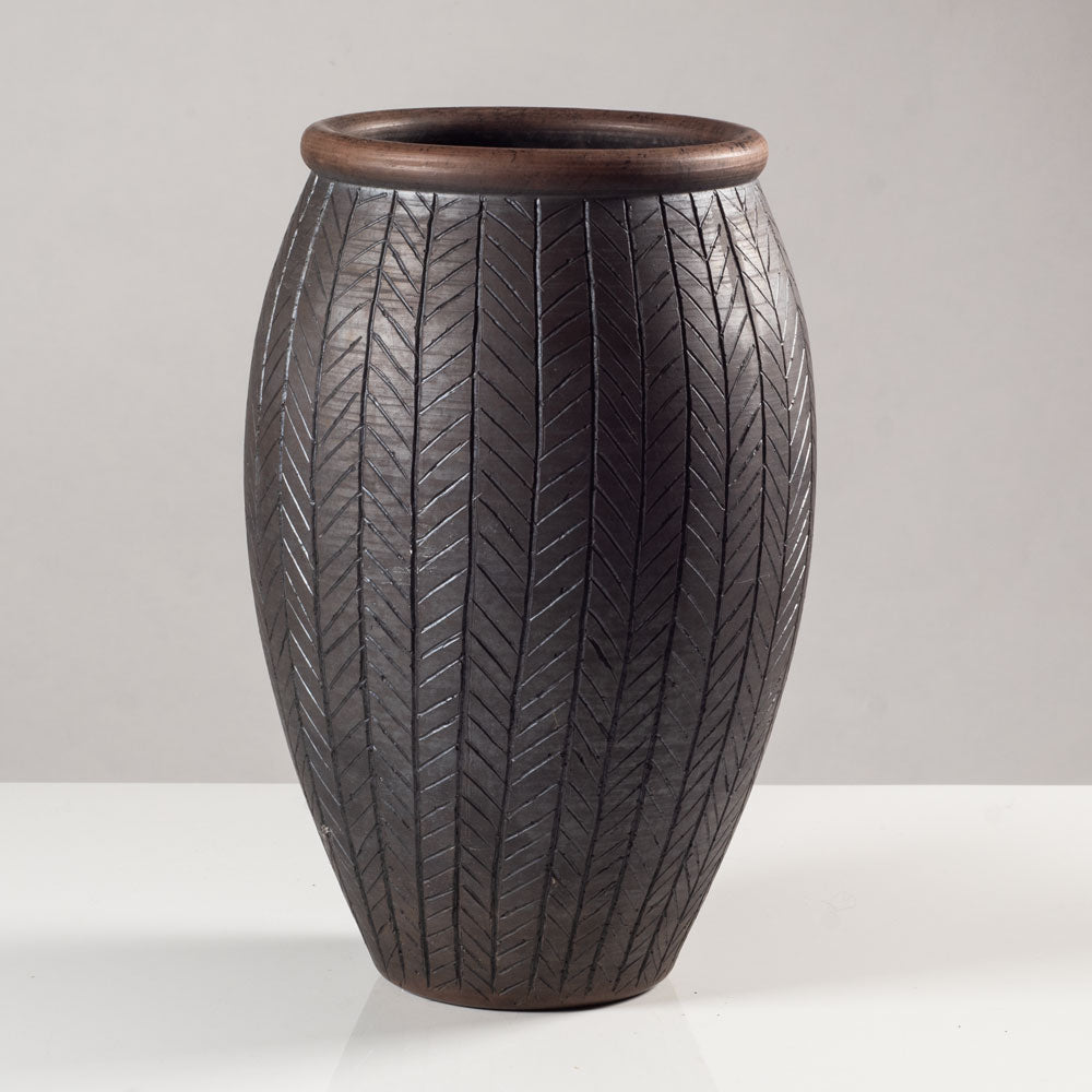 Tim Andrews, UK, earthenware raku vase with incised lines K3189