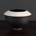 Karl Scheid, own studio, Germany

Unique porcelain vase with matte brown-black and white glaze
