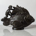 Just Andersen, Denmark, large "Disko" figure of of a mer-child riding a fish J1642