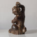 Knud Kyhn for Royal Copenhagen, Denmark, stoneware faun figure eating grapes with Sung glaze