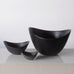 Three black ovoid bowls by Gunnar Nylund for Rörstrand