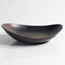 Carl Harry Stålhane for Rörstrand, Sweden, stoneware bowl with matte black and red glaze M4100