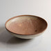 Nils Thorsson for Royal Copenhagen, Denmark, stoneware bowl with pink and white glaze L3399