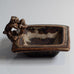 Bode Willumsen for Royal Copenhagen, Denmark, "The Tailor in Hell" square dish with sung glaze and sculptural form L3839