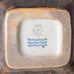 Bode Willumsen for Royal Copenhagen, Denmark, "The Tailor in Hell" square dish with sung glaze and sculptural form L3839