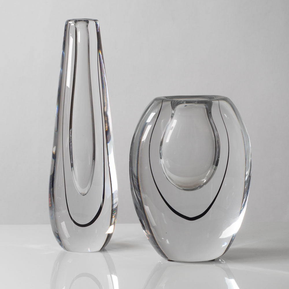 Two clear glass vases with internal black filament by Vicke Lindstrand for Kosta, Sweden