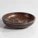 Knud Kyhn for Royal Copenhagen, Denmark, stoneware dish with ape in relief L3914