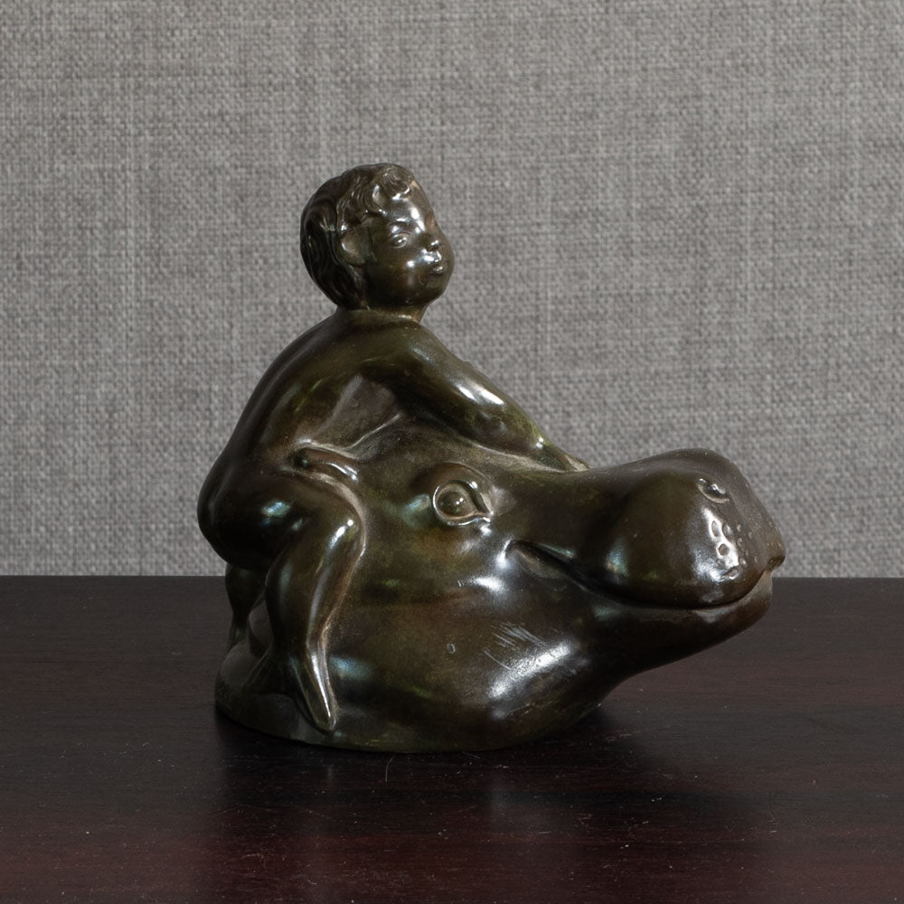 Just Andersen, Denmark, "Disko" figure of a mer-boy riding a hippo M4361