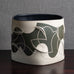 Gustavo Pérez, own studio, Mexico, irregularly shaped vessel with sliced exterior and matte black and beige glaze M4295