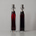 Carl Fagerlund for Orrefors, Sweden, pair of glass lamps in red and clear glass K2007 and K2008