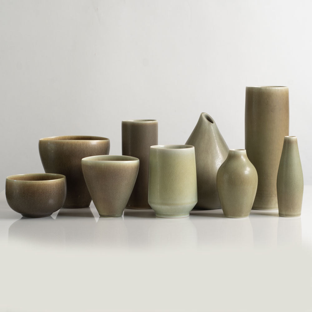 Group of vessels with olive haresfur glaze by Palshus, Denmark.