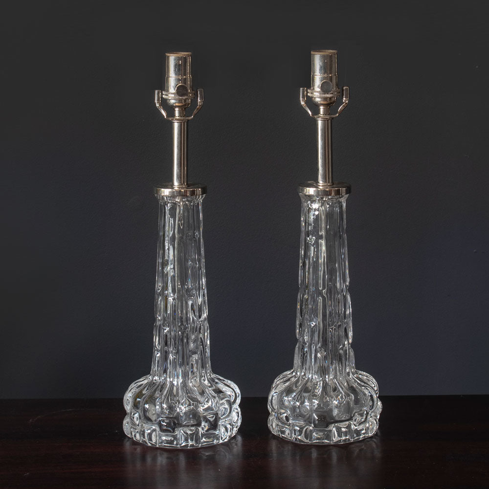 Carl Fagerlund for Orrefors, Sweden, pair of clear glass lamps J1561 and J1562