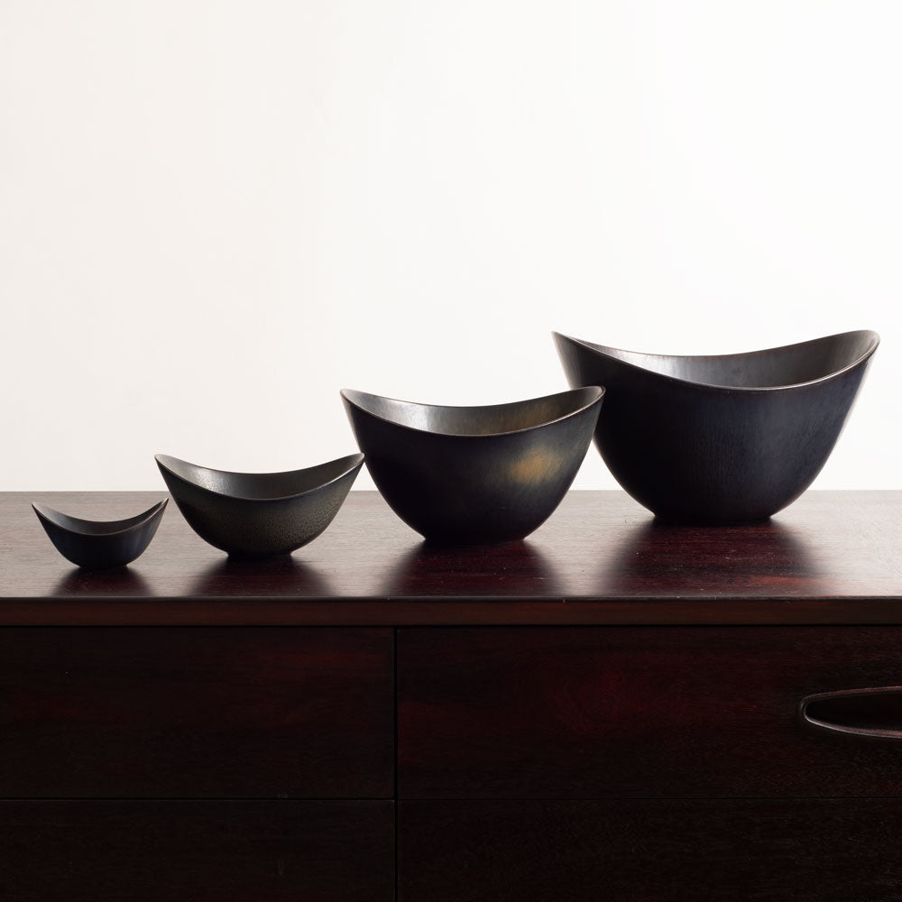 Group of ceramic elliptical bowls with black glaze by Gunner Nylund for Rorstrand, Sweden (Copy)