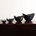 Group of ceramic elliptical bowls with black glaze by Gunner Nylund for Rorstrand, Sweden (Copy)