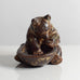 Knud Kyhn for Royal Copenhagen, Denmark, stoneware figure of a bear with a bowl M5757