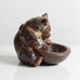 Knud Kyhn for Royal Copenhagen, Denmark, stoneware figure of a bear with a bowl M5757