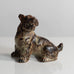 Knud Kyhn for Royal Copenhagen, Denmark, stoneware figure of a dog with Sung glaze M5722